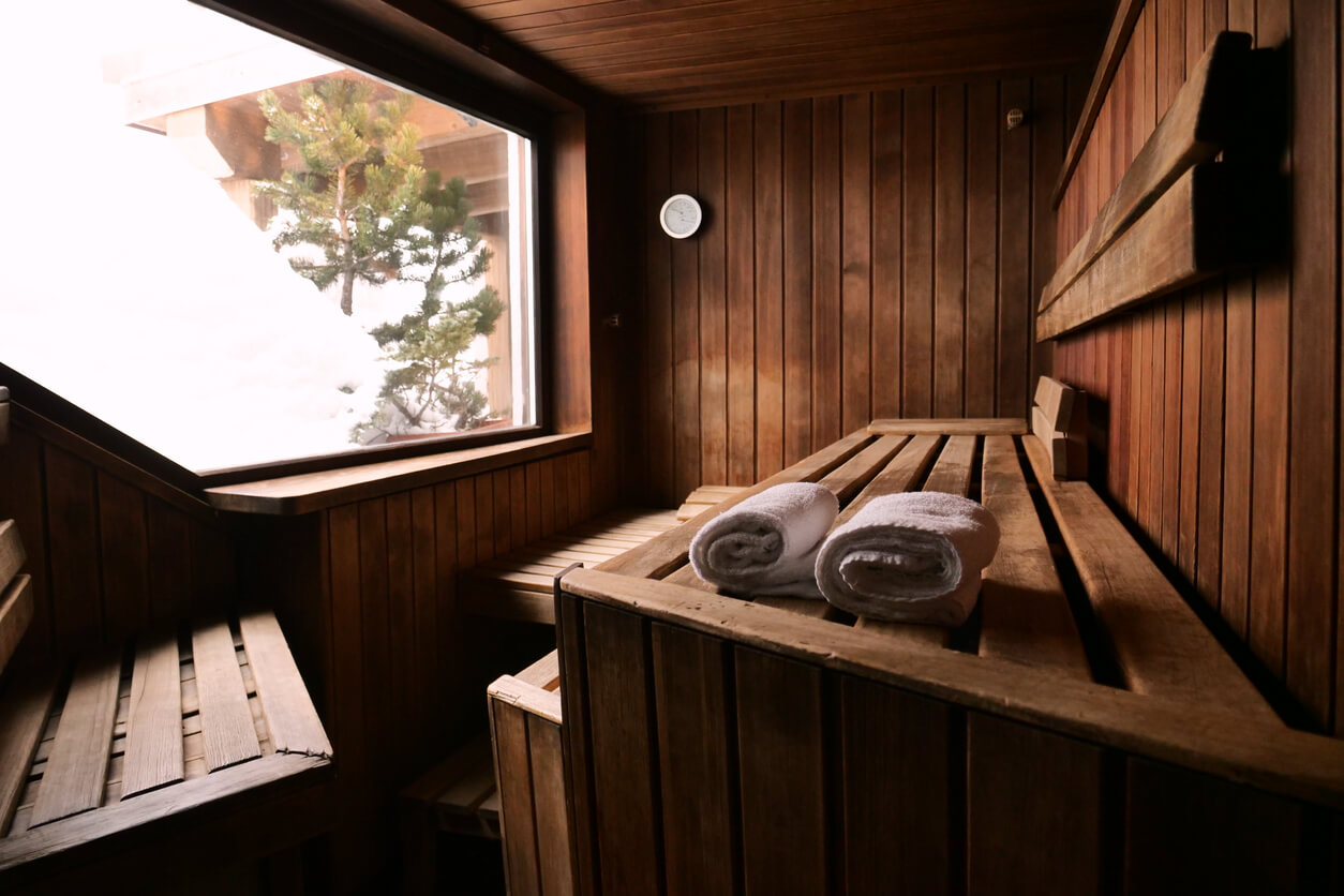 wood sauna with a large window